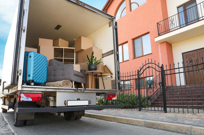 Moving truck full of boxes and furniture