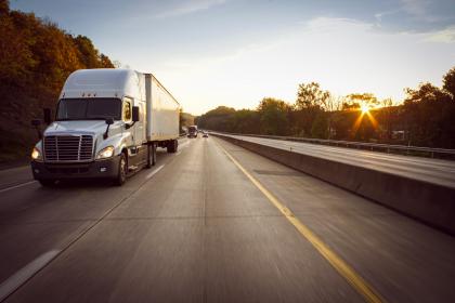 Truck Moving on Highway in Golden Hour